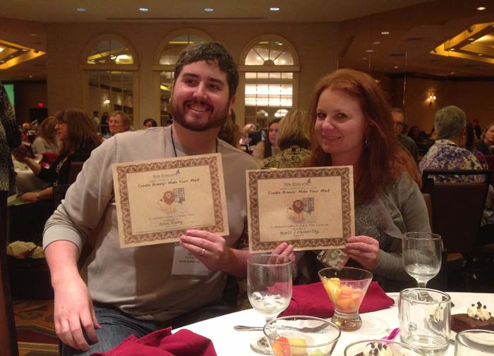 Kevin Barry and Marlo Garnsworthy holding their awards